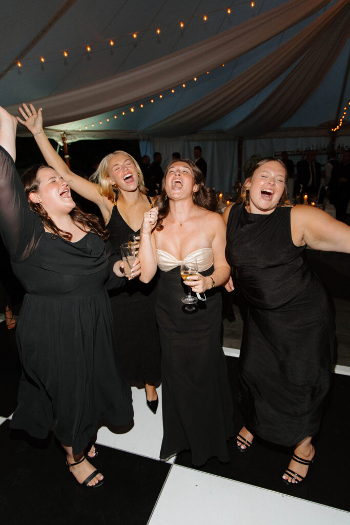 Wedding guests dance on dance floor at the Floriana