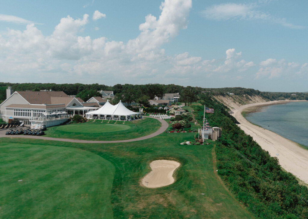 drone photo of the white cliffs country club summer wedding on the cape